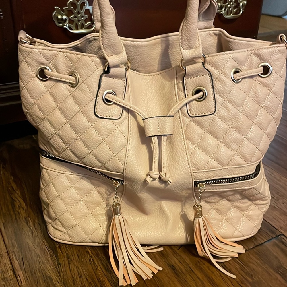 Beige color tote style handbag